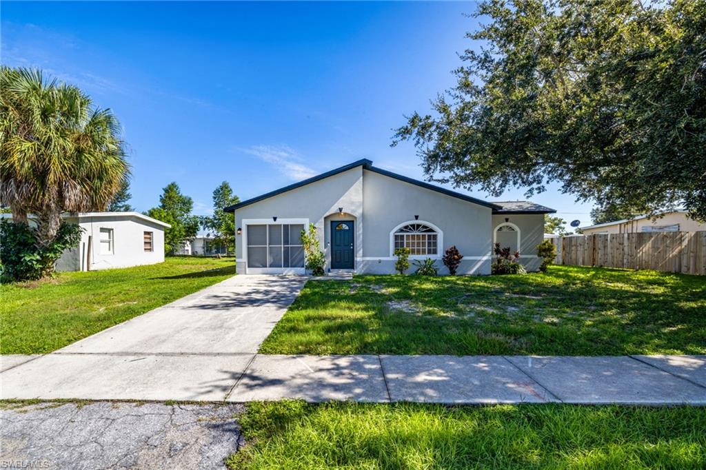 Front of home showcasing sidewalks