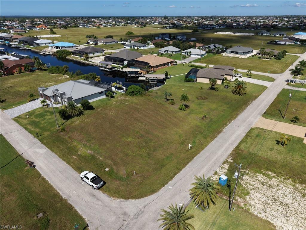 Expansive corner lot with paved road frontage