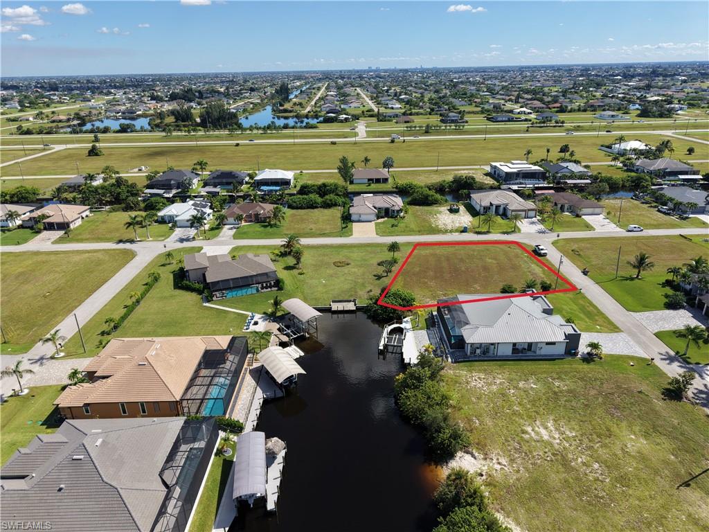 Vacant lot featuring a street-facing orientation and canal frontage