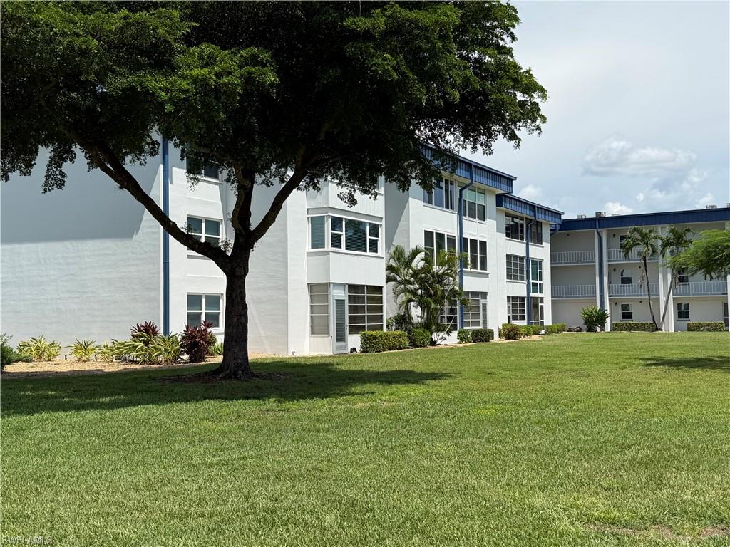 Expansive green space with mature trees