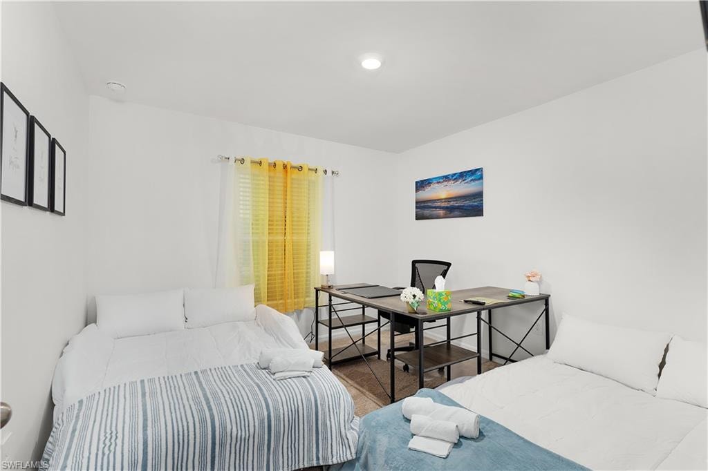 White walls with recessed ceiling lighting