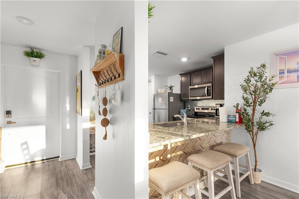 Wood-finish flooring throughout