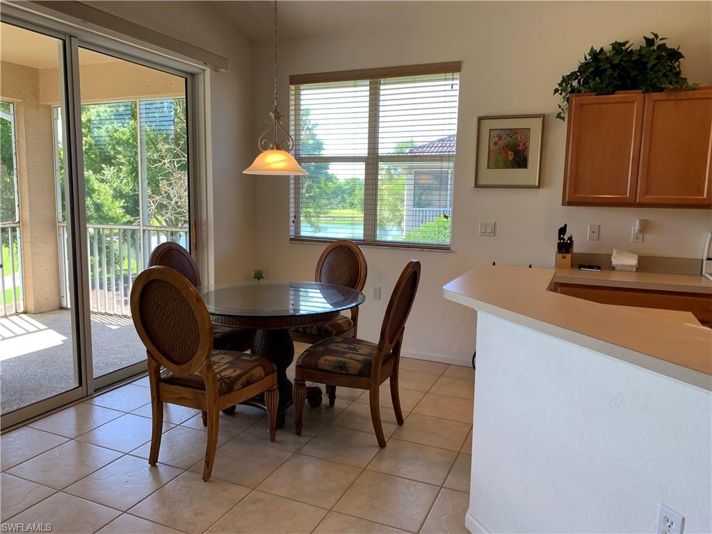 Dinette to the other side of the Kitchen facing the lake and golf course