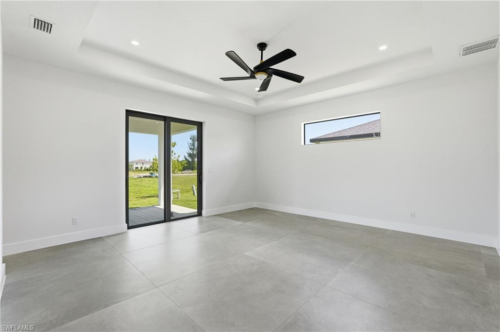 Primary Bedroom with access to lanai.
