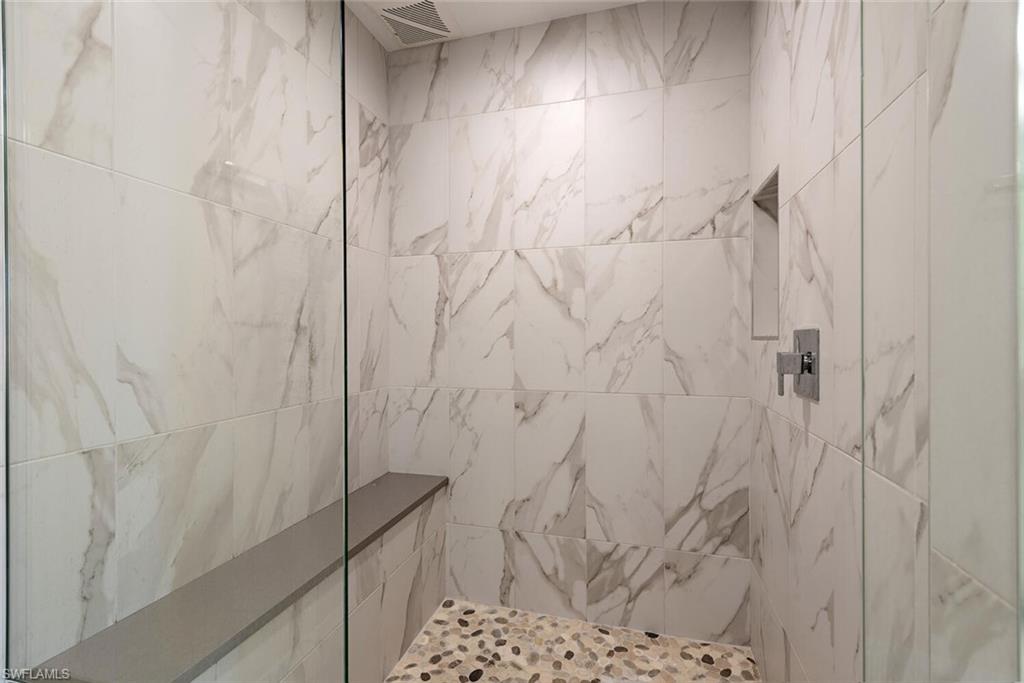 Bathroom with a tile shower