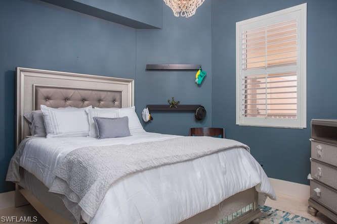 Bedroom with a chandelier