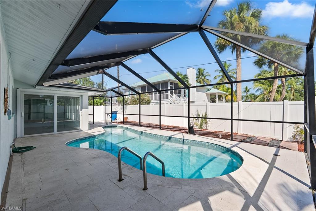 Inviting pool with screen enclosure