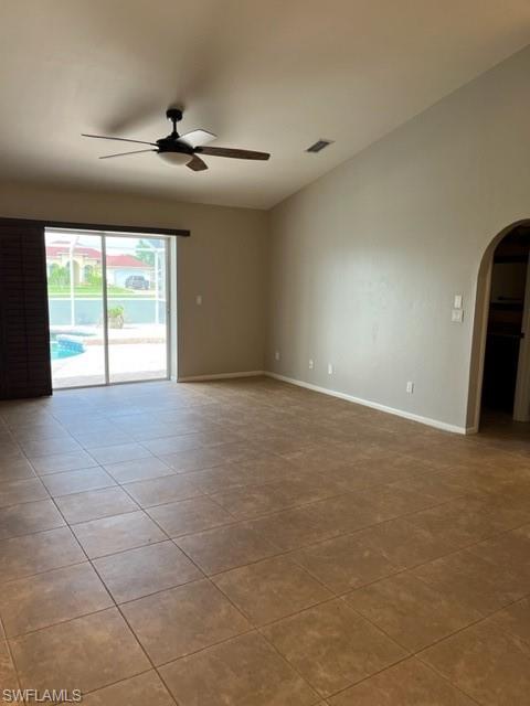 tile family room opens to pool