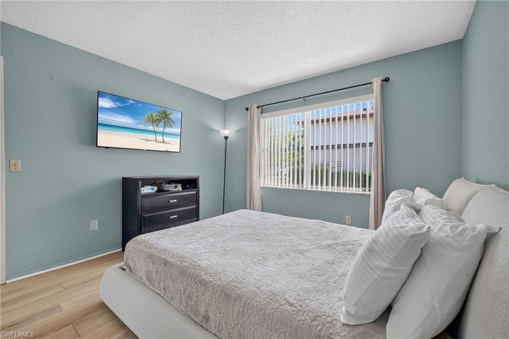 Wood-finish flooring with a neutral wall color