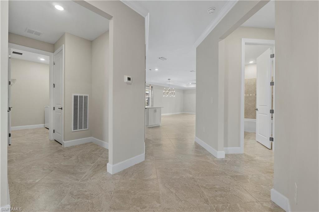 Neutral-toned tile flooring throughout