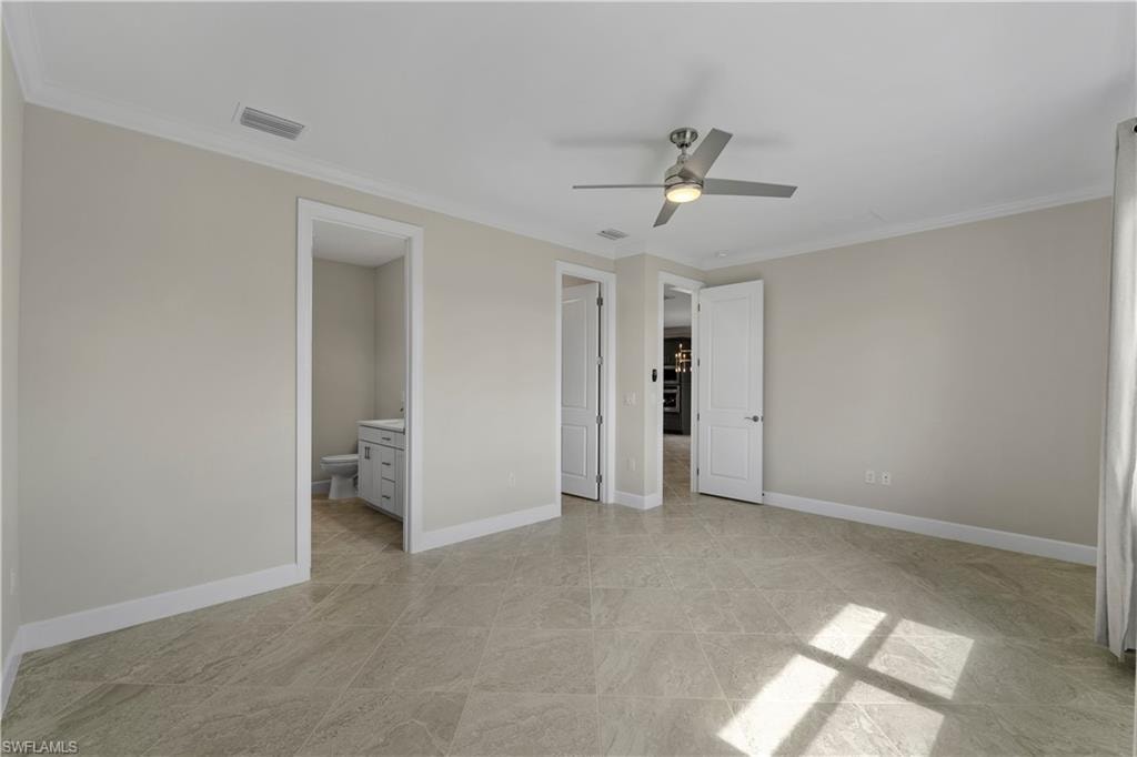 Recessed lighting, crown molding, modern ceiling fan, large format tile flooring, and white trim