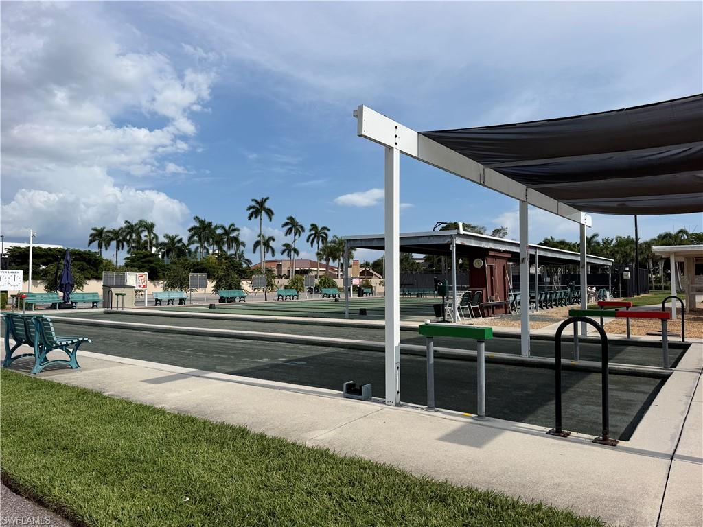 Bocce ball courts featuring shade structures and perimeter seating