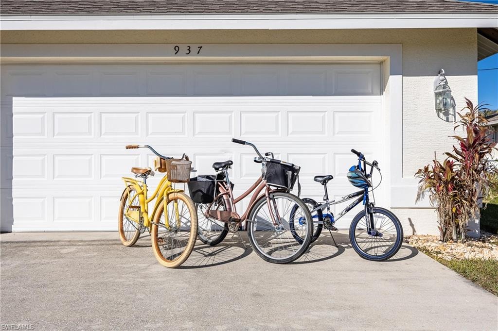 Garage featuring driveway