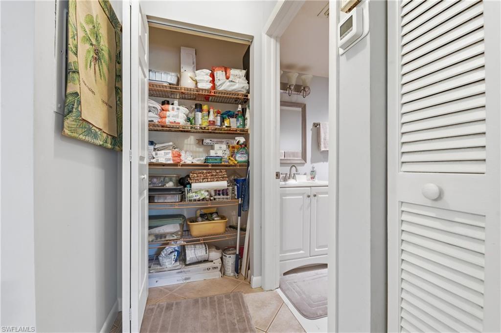 Deep linen and pantry closet in the hall, practical everyday storage