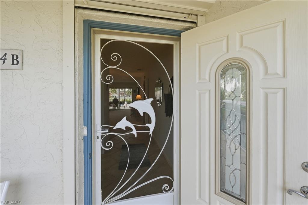 Paneled entry door with decorative glass inlay