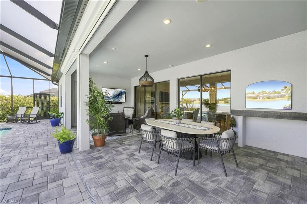 outdoor covered dining area with electric fabric screens