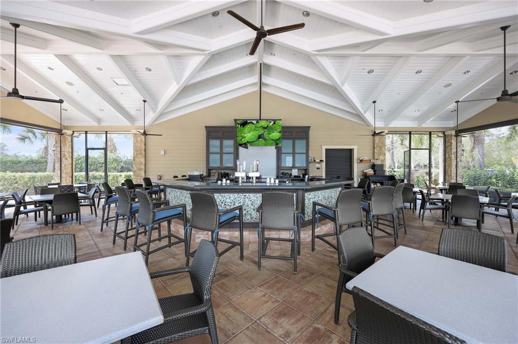 Open-air resident only Shady Palm lounge featuring lunch, dinner and happy hours