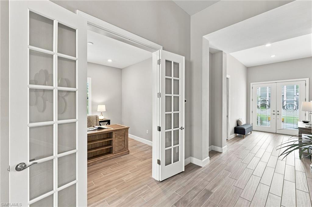 bright entry way with French doors to Den/ home office/ flex room