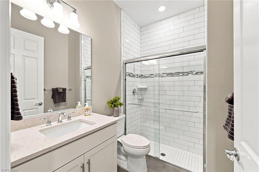 Bath 3 with glass shower enclosure, subway tile