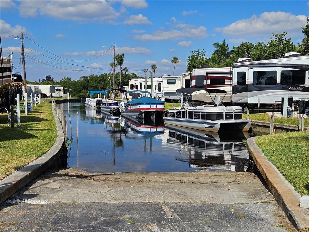 Canal entry featuring a concrete boat ramp