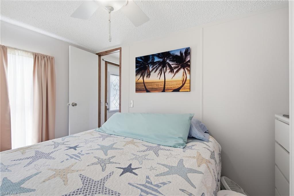 White ceiling fan with light fixture