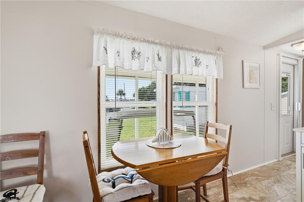 Neutral wall finishes and window treatments
