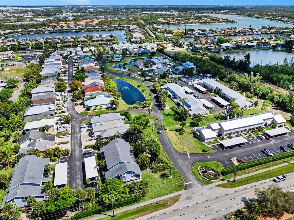 Waterfront canal access, paved roadways, and integrated parking structures