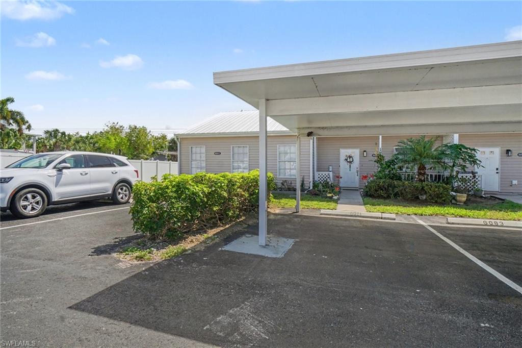 Covered carport parking for two vehicles