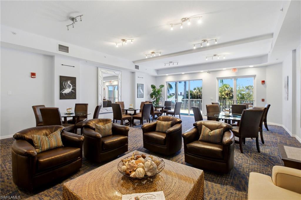 An inviting entertainment room, perfectly suited for both intimate gatherings and larger social occasions, located on the second level.