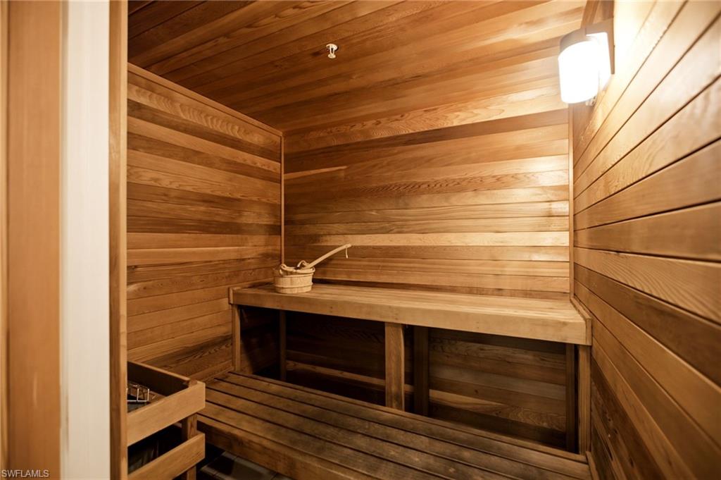 Among the exceptional amenities at Waterside at Bay Beach IV is a well-appointed fitness facility, relaxing sauna, and inviting entertainment room, perfectly suited for both intimate gatherings and larger social occasions.