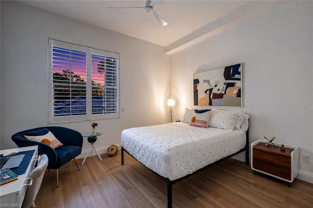 Guest bedroom with hardwood