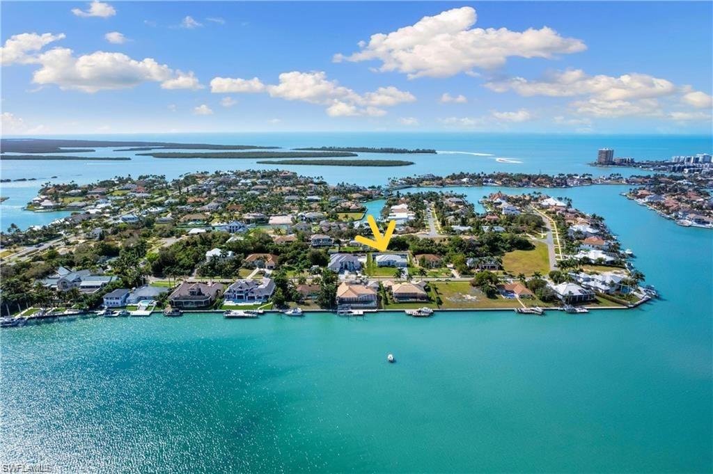 Aerial view of residential area with a nearby body of water