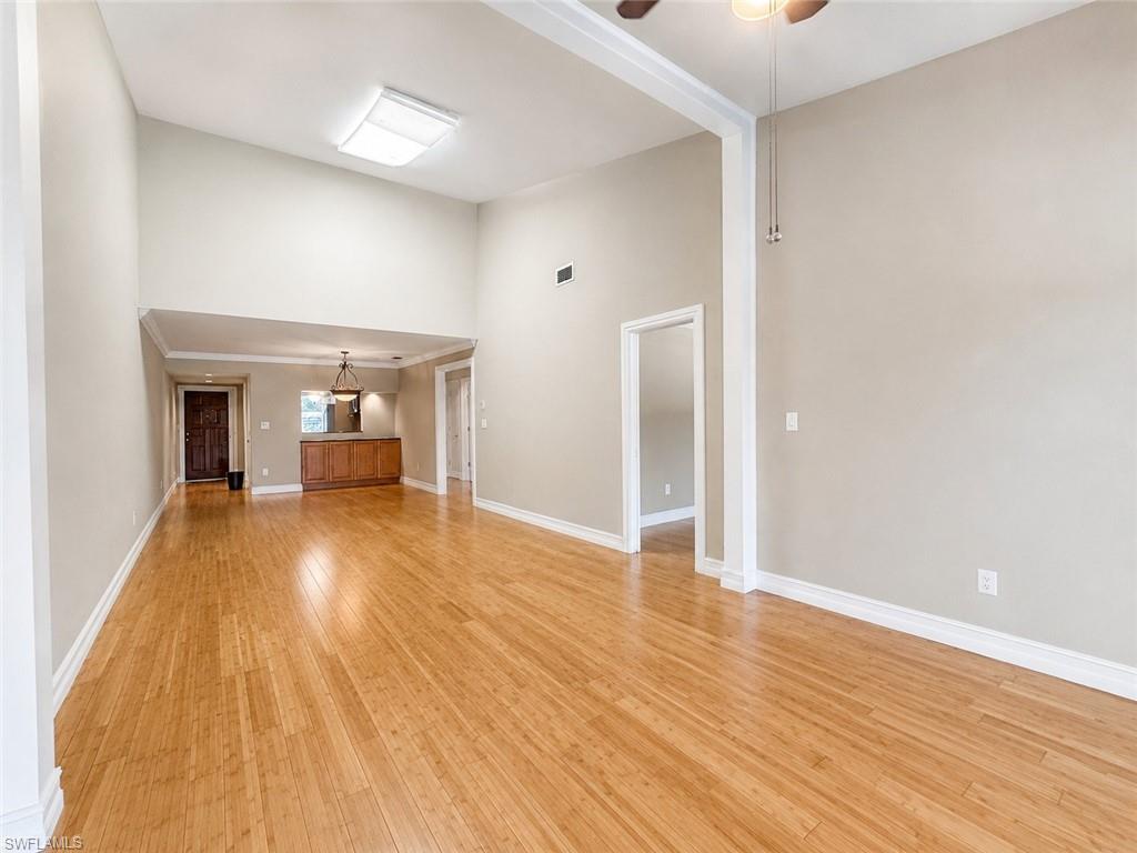 Soaring vaulted ceilings and wood-finish flooring