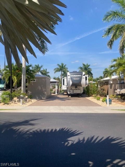 View of front of house with concrete driveway