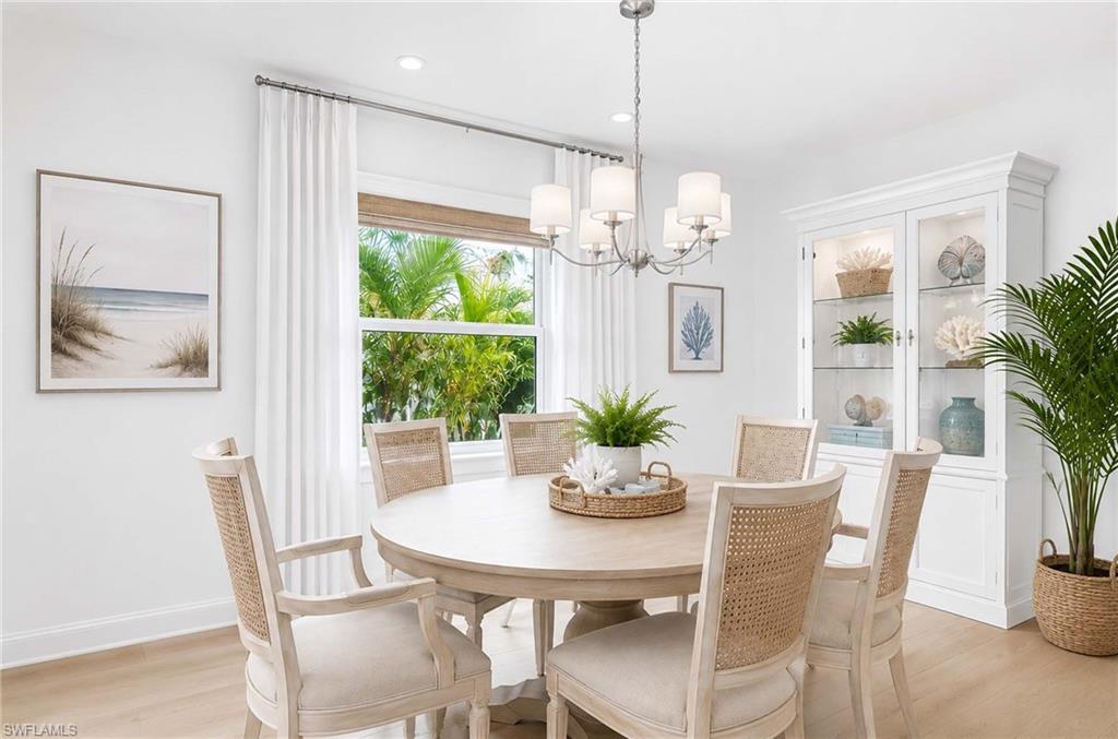 Virtual Renovation: Recessed lighting, wood-finish flooring, and a window with blinds and drapes