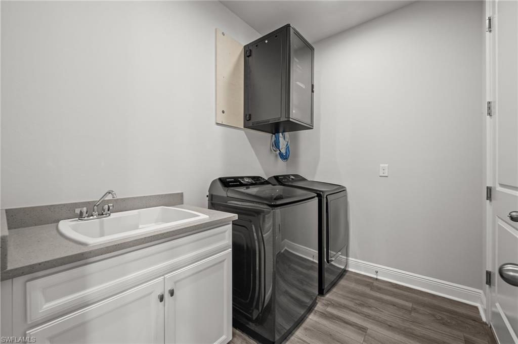 The in-home automation system is located in the laundry room and could easily be enclosed with a custom cabinet.