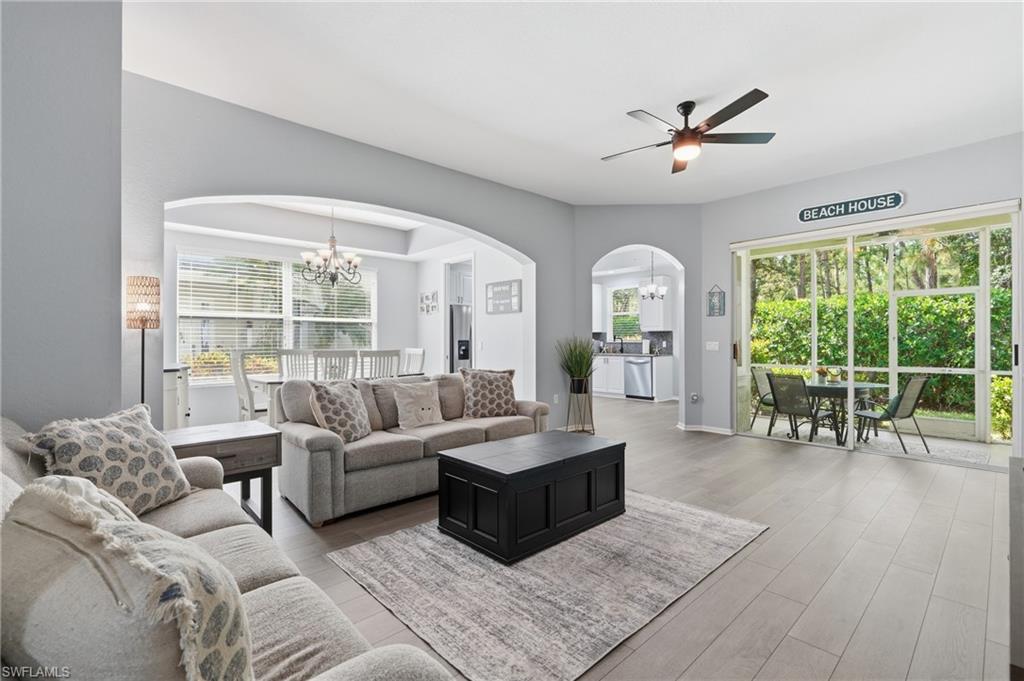 Light gray walls with wood-finish flooring