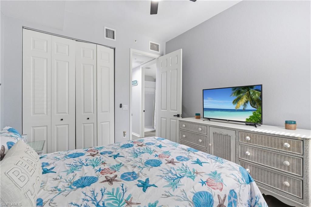 Recessed lighting, ceiling fan, bi-fold closet doors, and wood-finish door