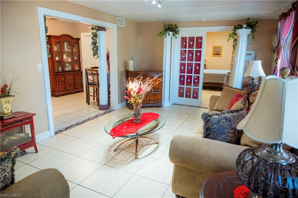 Tile flooring throughout with clear sightlines between living spaces