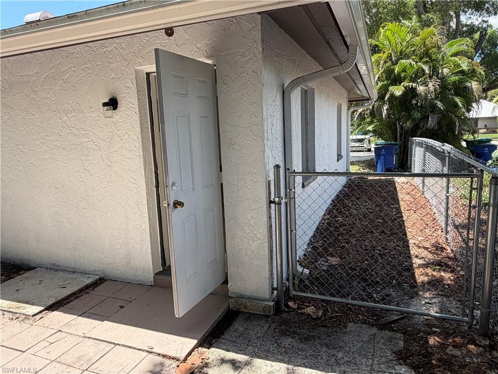 Exterior wall with textured stucco finish