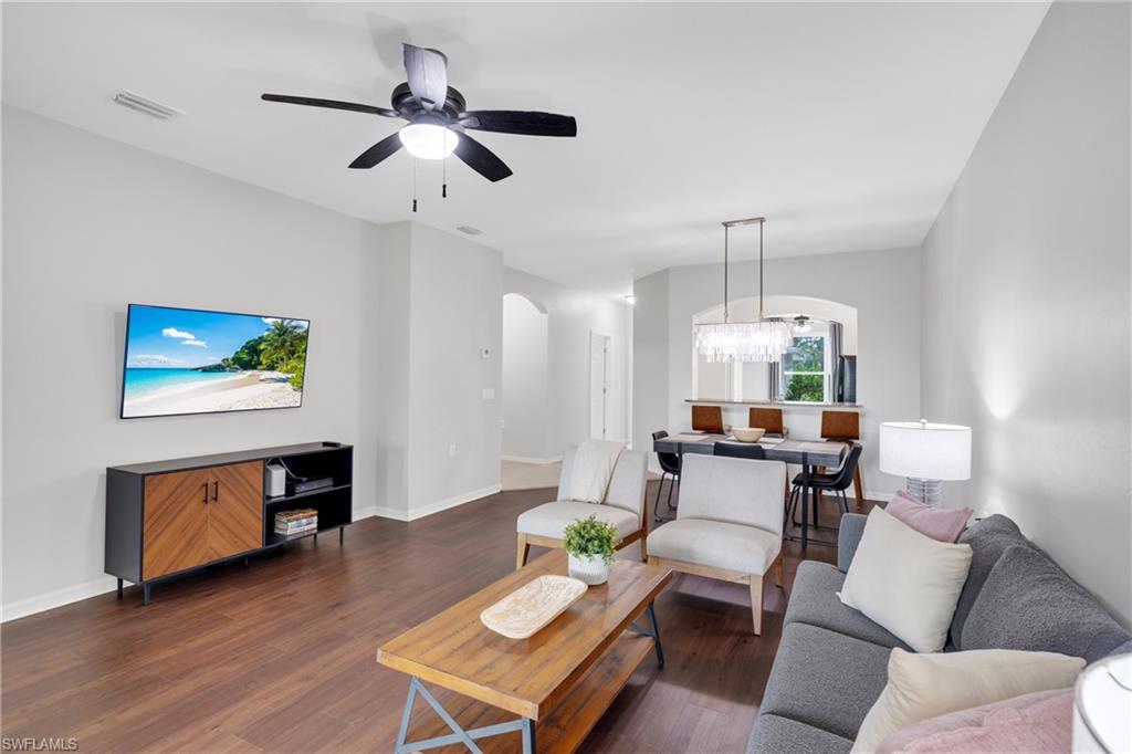 Wood-finish flooring throughout, complemented by light neutral wall tones