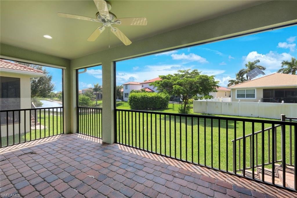 Screened patio featuring a ceiling fan, recessed lighting, and paver flooring