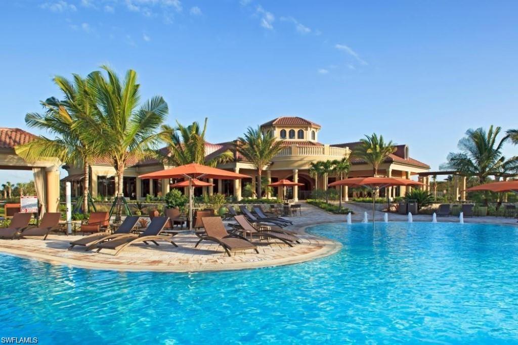 Community pool with a patio area
