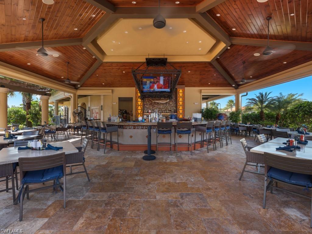 View of patio featuring outdoor dining space and ceiling fan