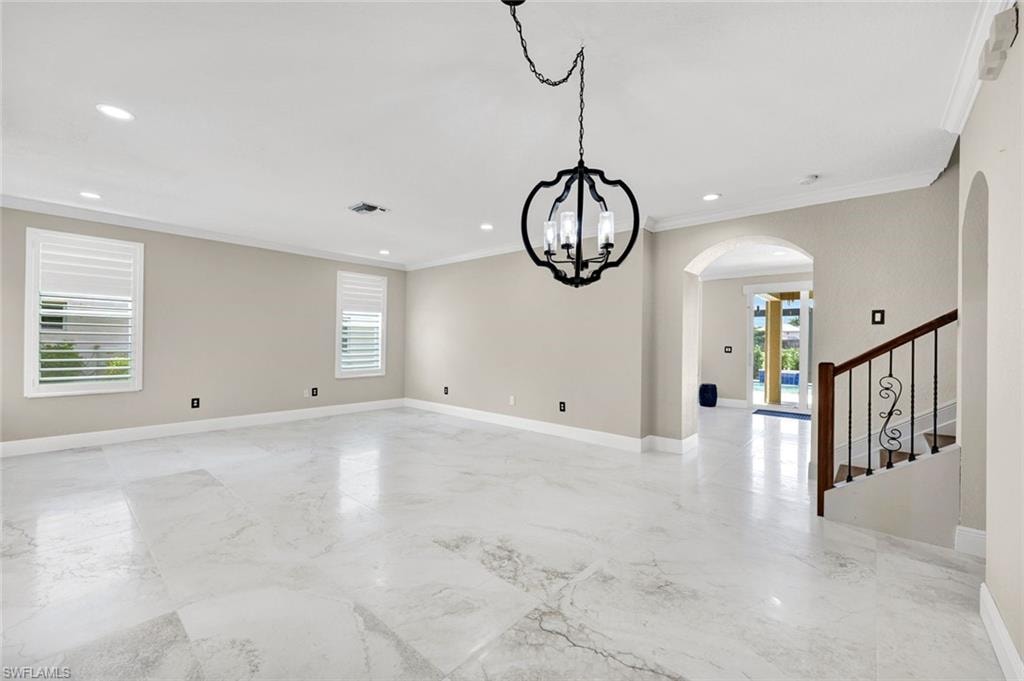 Front Entrance living area with beautiful reimagined stairway.
