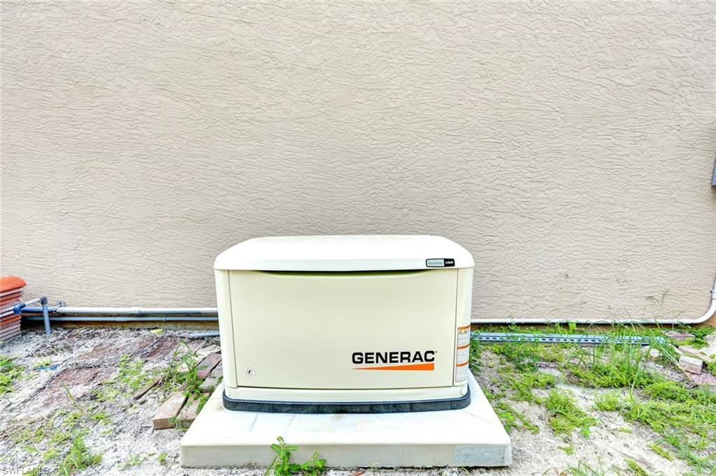 Generac whole-home generator with 500 gal propane tank.