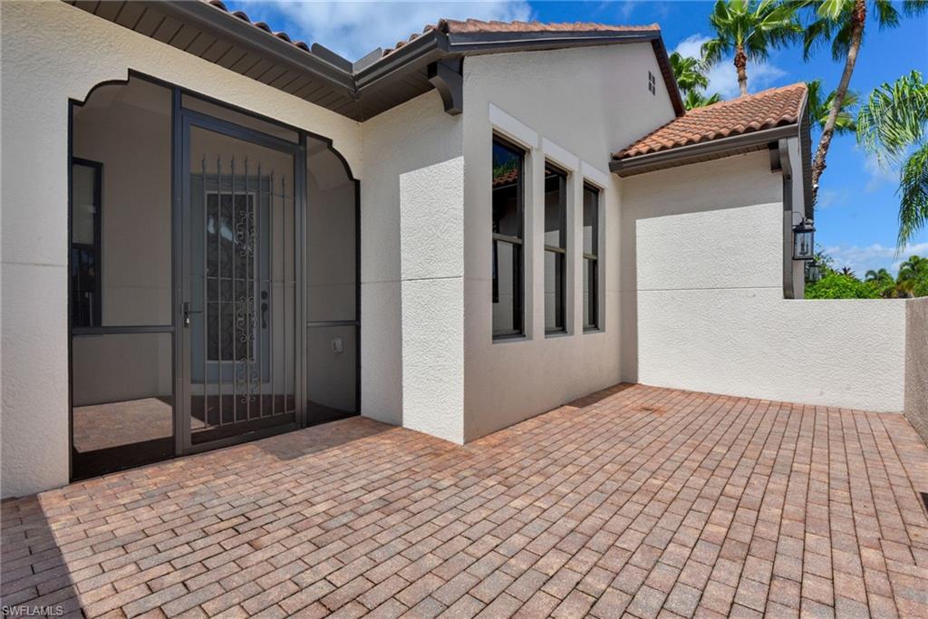 Open Courtyard & Screened Front Entry