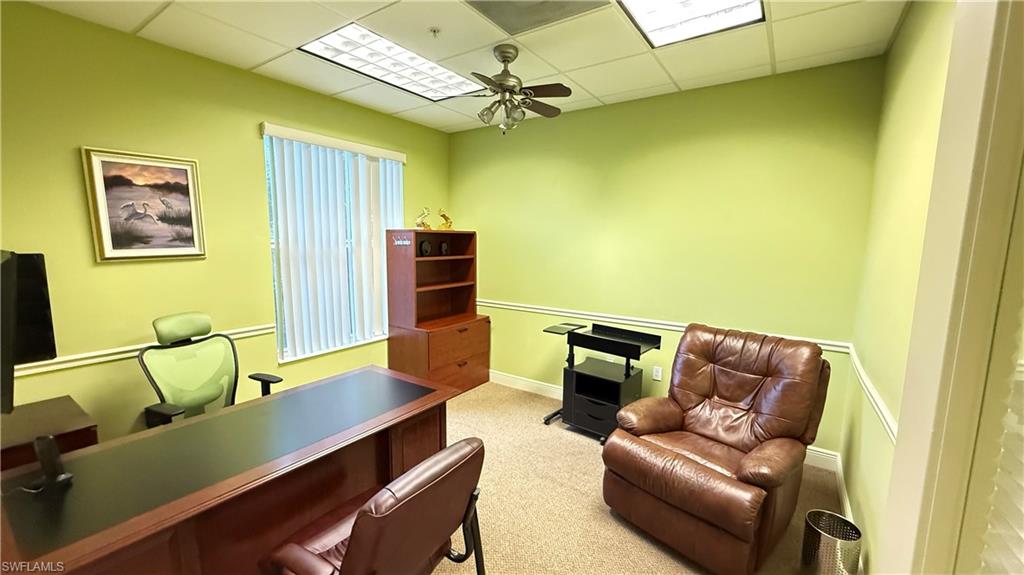 Carpeted office #2 with a ceiling fan and a drop ceiling