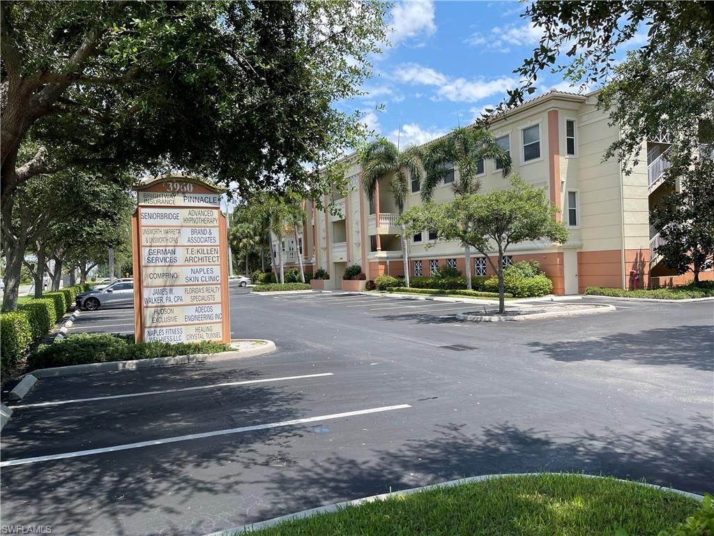 View of asphalt street with curbs