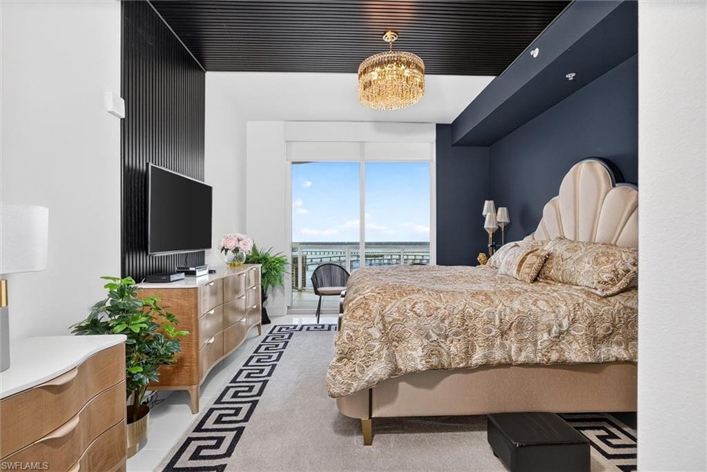 Floor-to-ceiling windows with water scenery